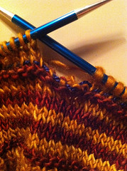 Spotting a dropped stitch is easier for experienced knitters.