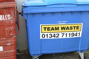 Waste bin labeled TEAM WASTE