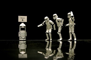 Storm Trooper action figures startled by a Storm Trooper trash bin