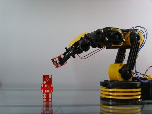 robotic arm lifting dice