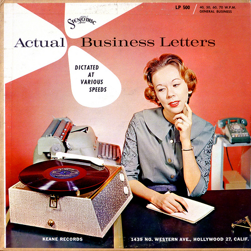 Cover from record for practicing stenography. Shows record player, typewriter, and rotary phone.